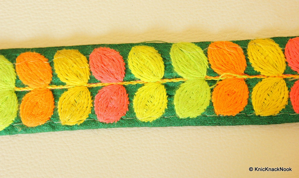 Green Fabric Trim With Pink, Yellow, Orange And Green Embroidery