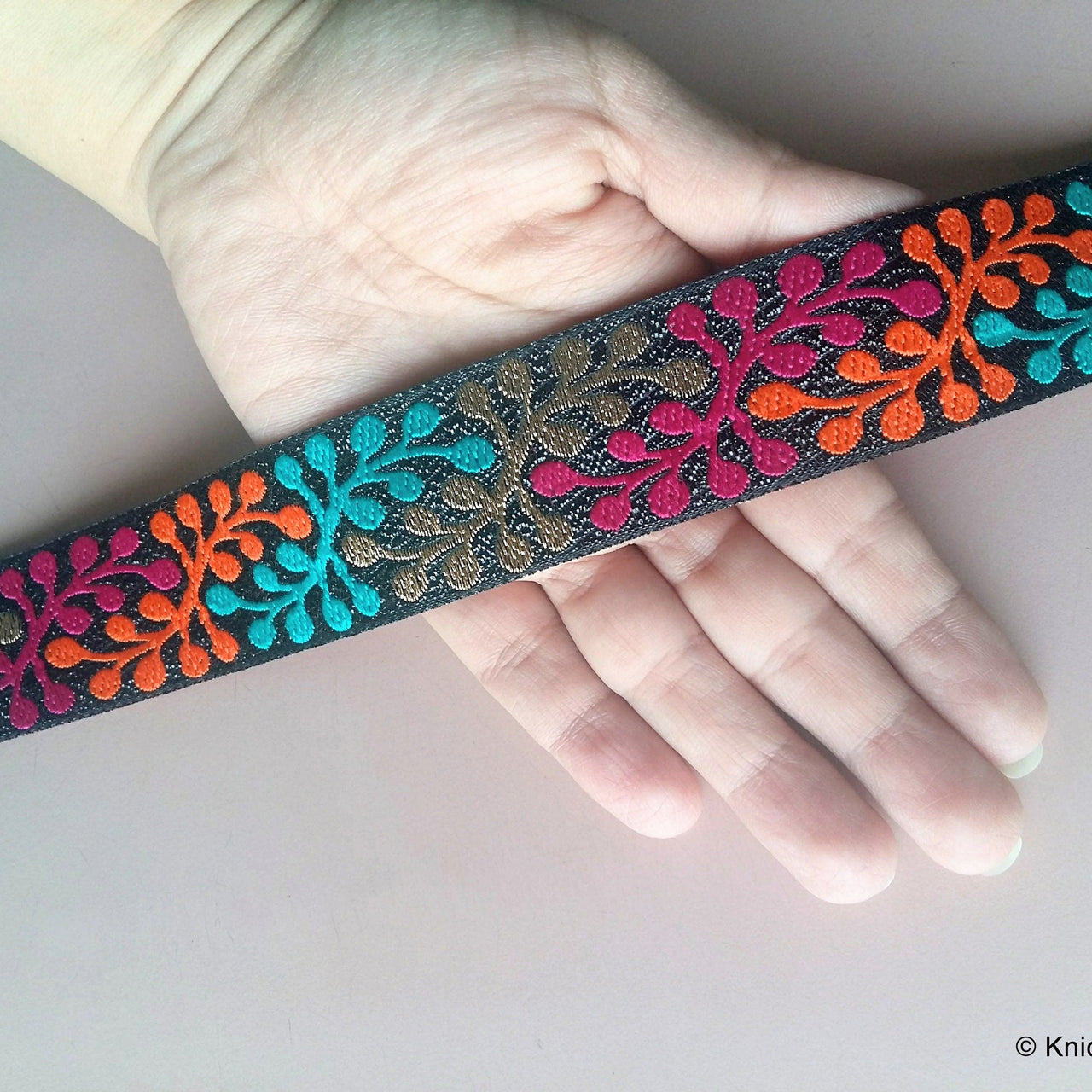 Shimmer Black Fabric Trim With Orange, Gold, Green And Fuchsia Thread Embroidery - 200317L278