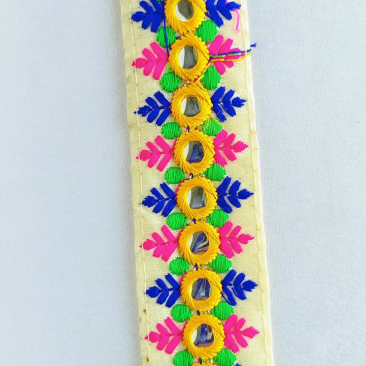 Beige Mirrored Fabric Trim With Yellow, Fuchsia Pink, Blue And Green Embroidery