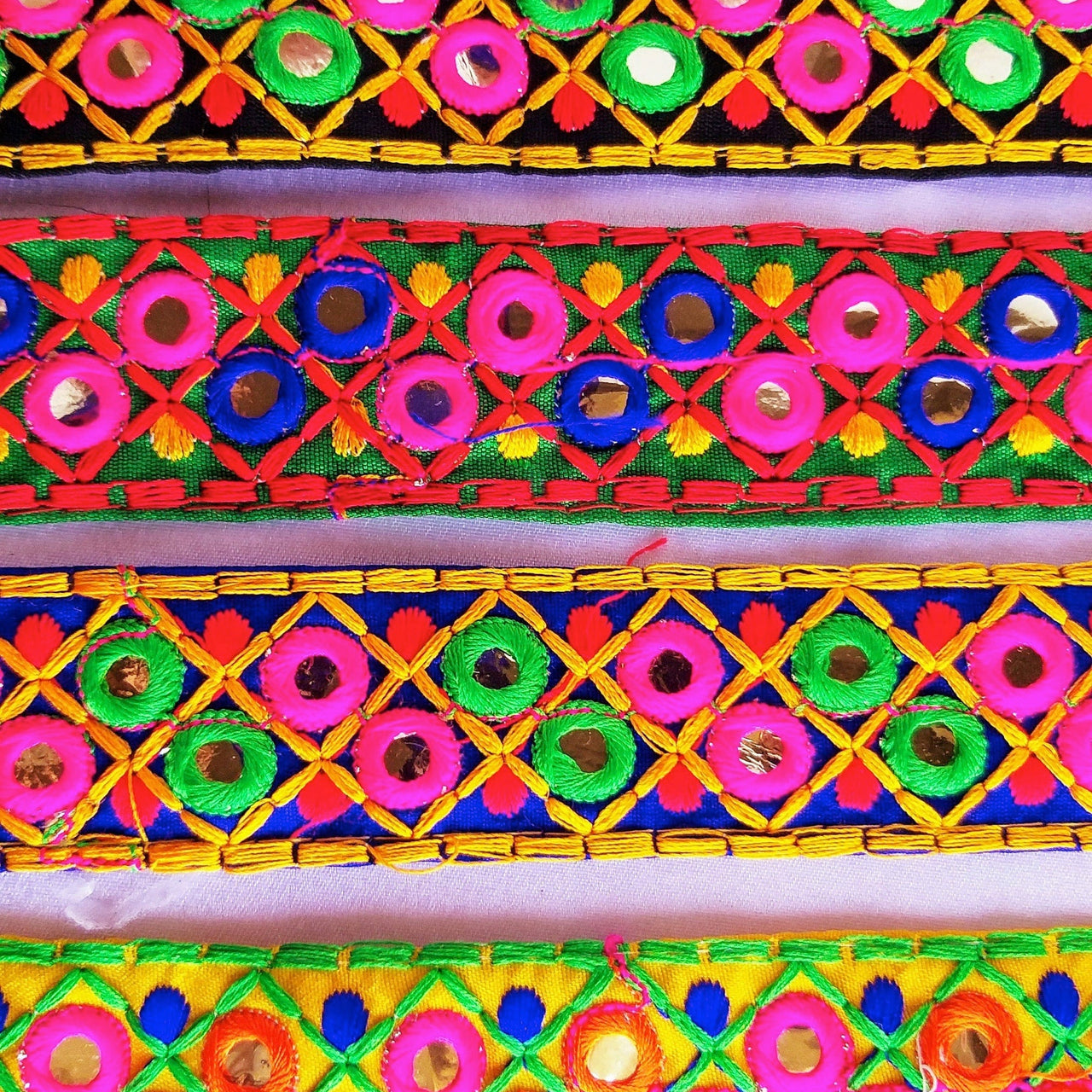 Blue Cotton Fabric Mirrored Trim With Embroidery In Fuchsia Pink, Green, Red & Yellow Threads