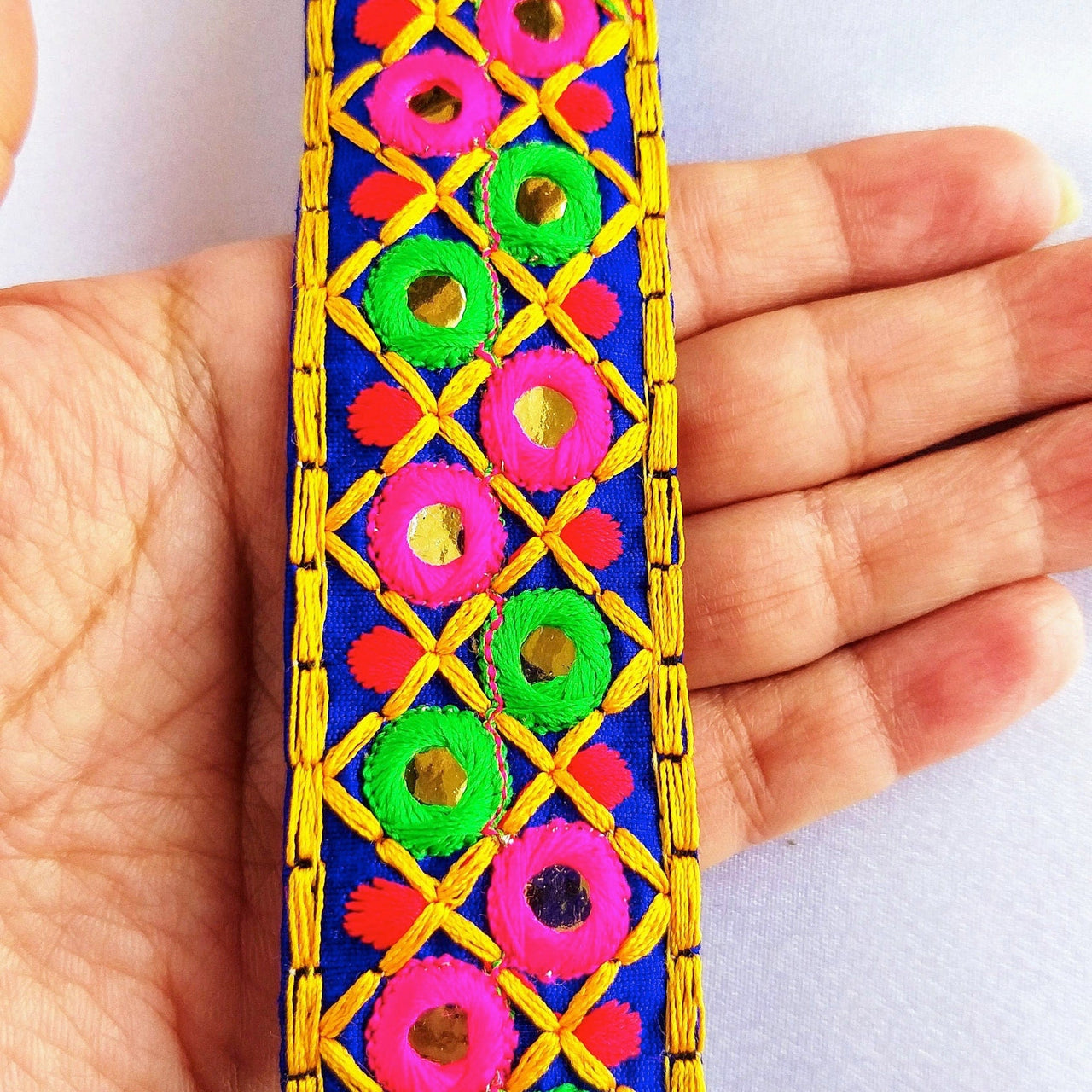 Blue Cotton Fabric Mirrored Trim With Embroidery In Fuchsia Pink, Green, Red & Yellow Threads