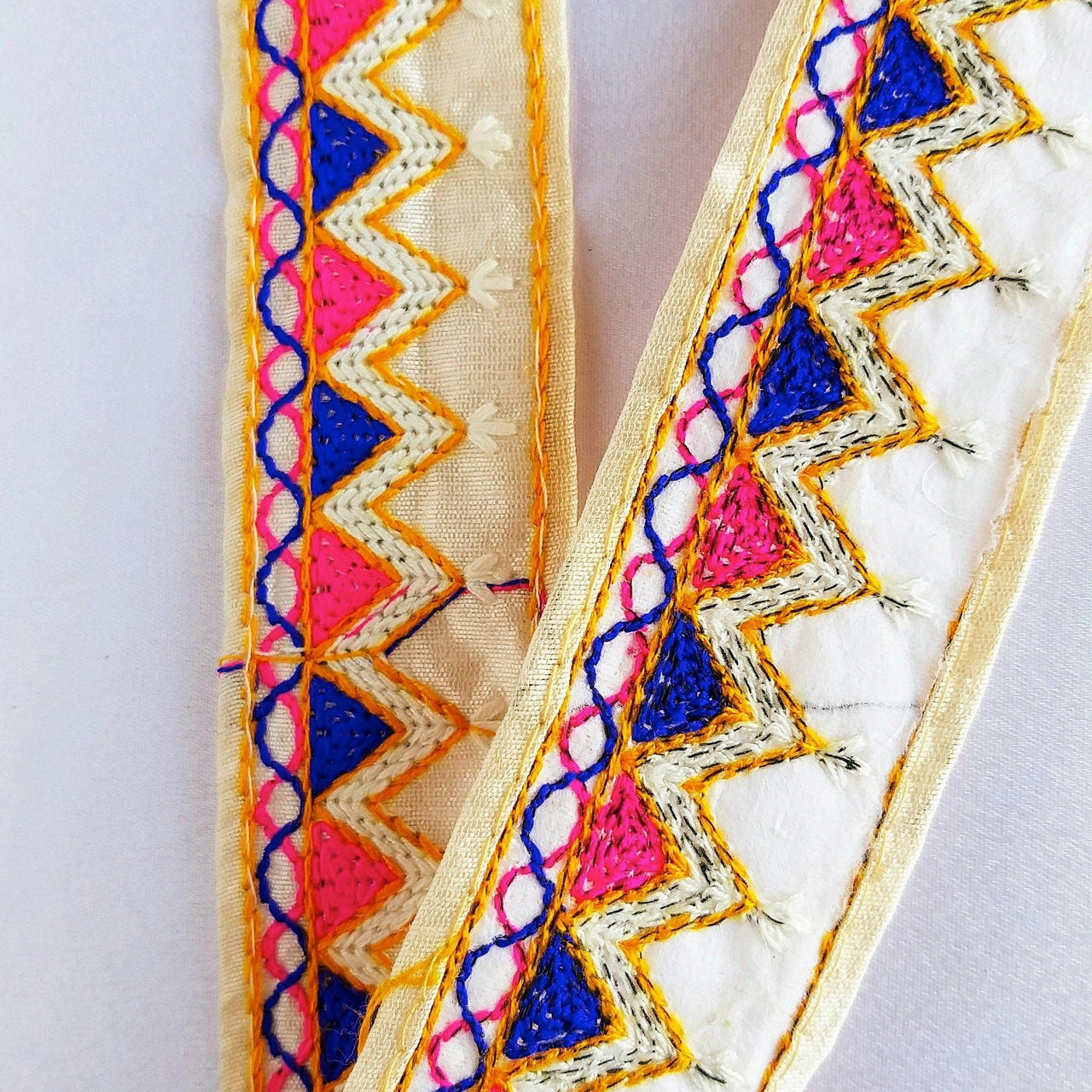 Beige Cotton Fabric Trim With Pink, Blue, Off White & Yellow Embroidery