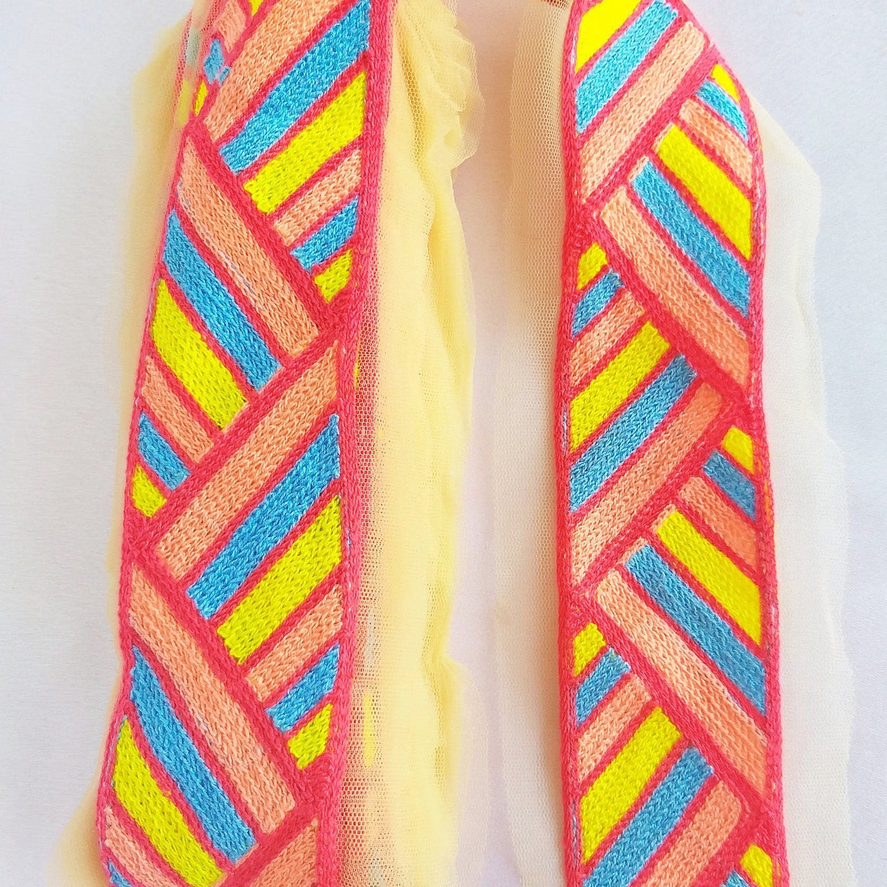 Beige Net With Coral Pink, Blue, Yellow And Red Embroidery