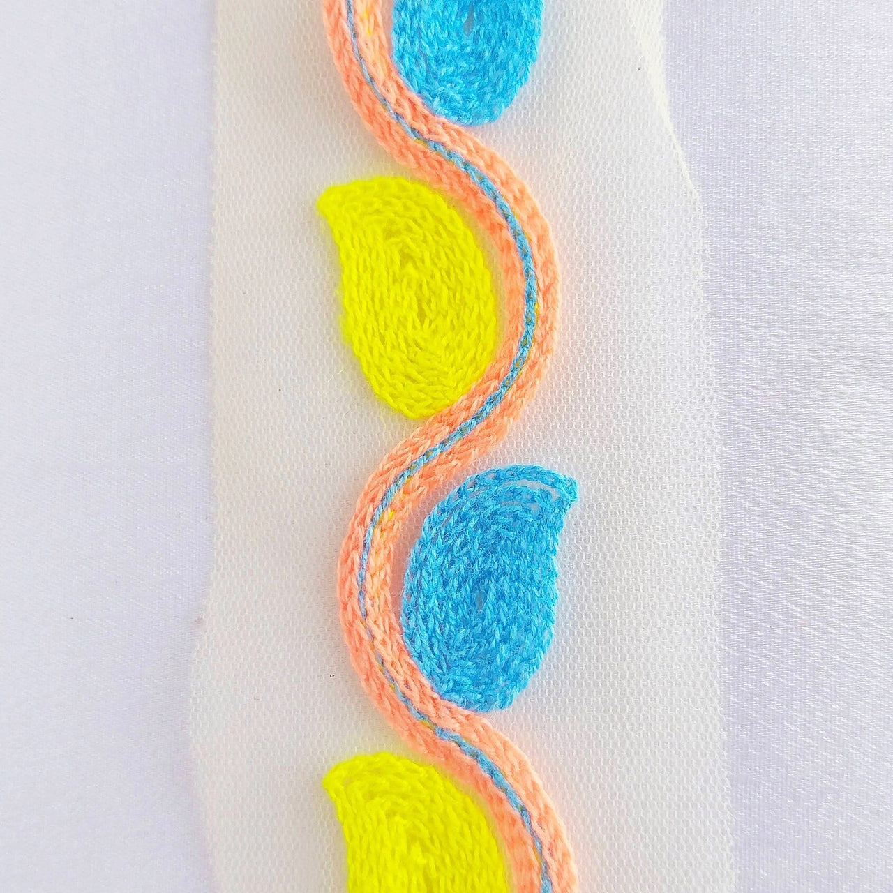 Beige Net With Yellow, Blue And Orange Embroidery, Leaves Pattern Trim