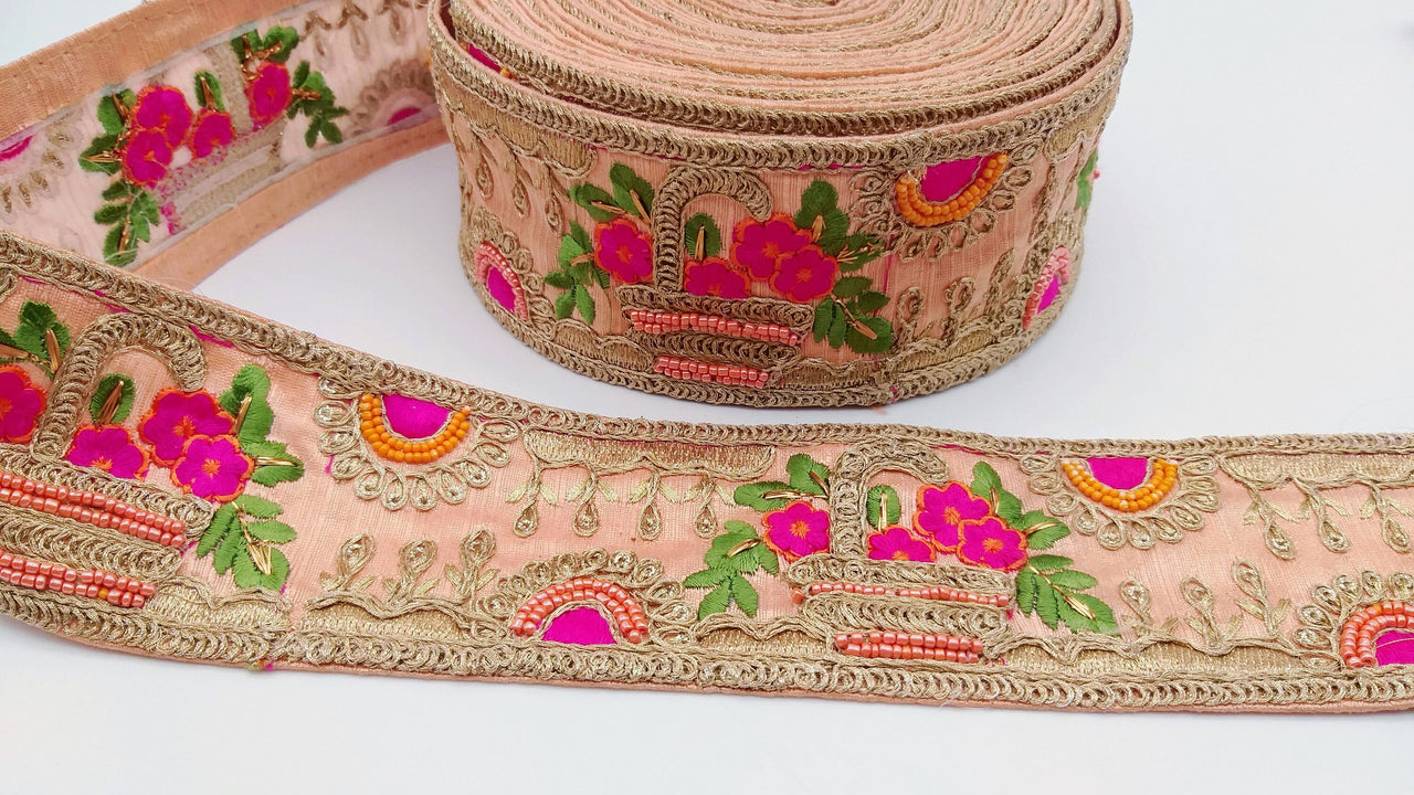 Peach Art Silk Fabric Trim With Green, Orange, Fuchsia Pink And Gold Floral Embroidery