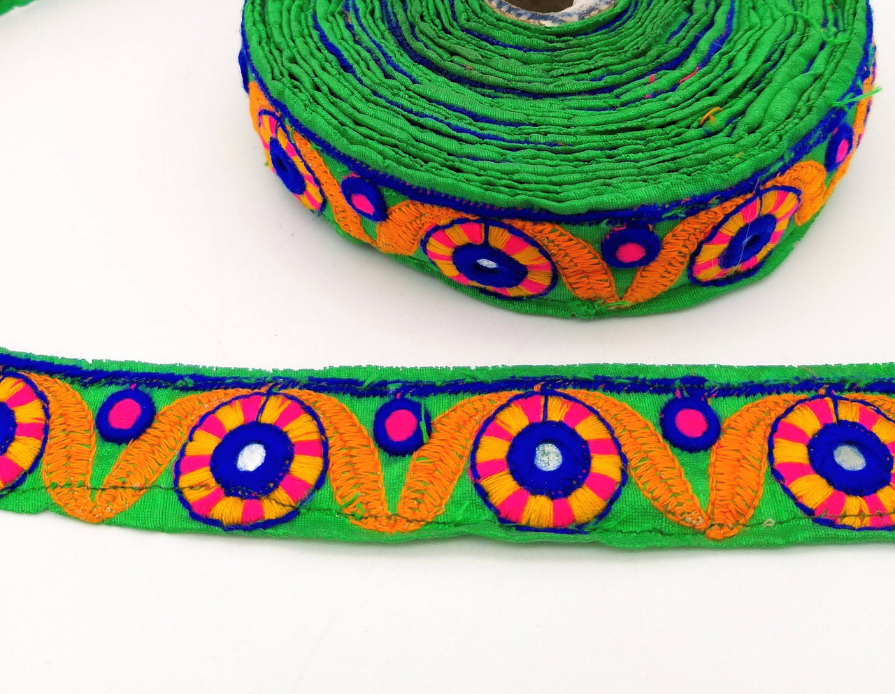 Green Mirrored Fabric Trim With Orange, Yellow, Blue And Pink Embroidery