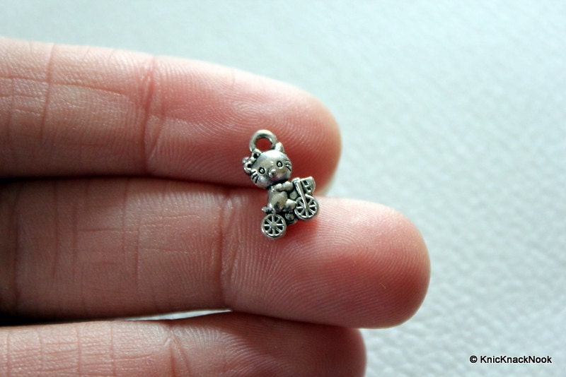 10 x Tibet Silver Cat / Kitty on a Bike Charms