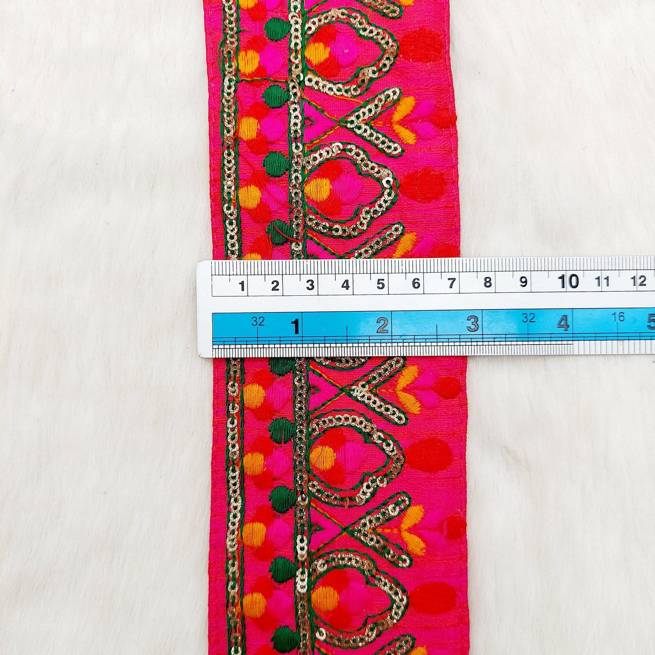 Deep Pink Fabric Trim With Green, Fuchsia Pink, Red And Orange Embroidery and Gold Sequins