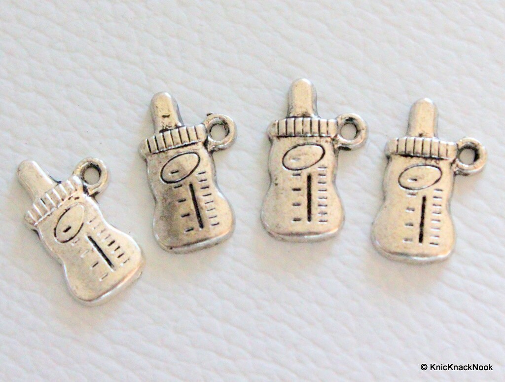 Silver baby bottle charms x 4