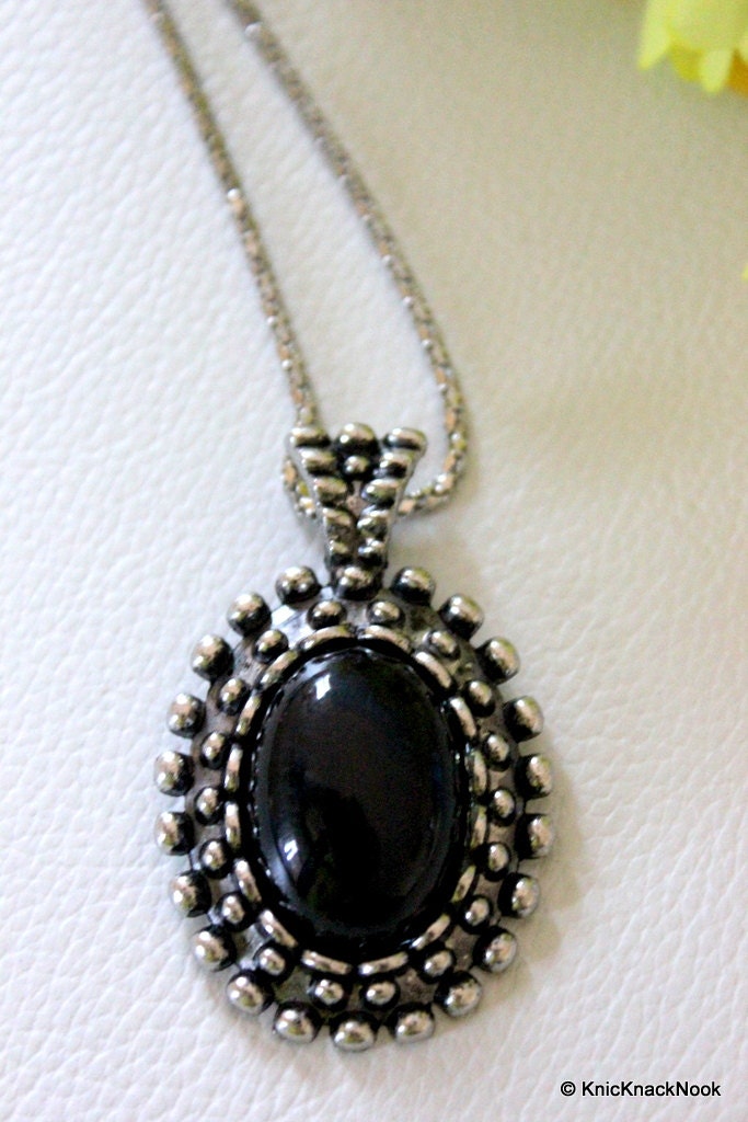 Black and Silver Tone Pendant