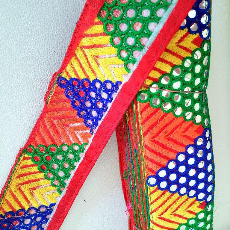 Red Mirrored Fabric Trim With Yellow, Orange , Green And Blue Embroidery With Mirrors