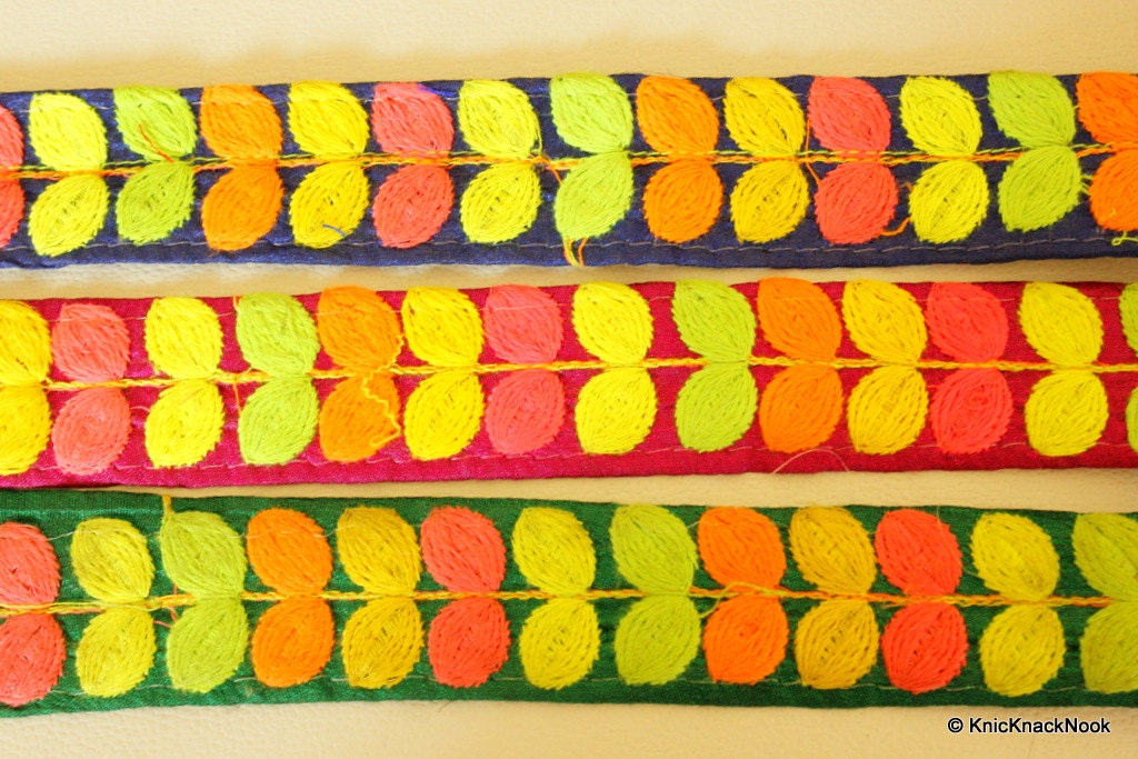 Green Fabric Trim With Pink, Yellow, Orange And Green Embroidery