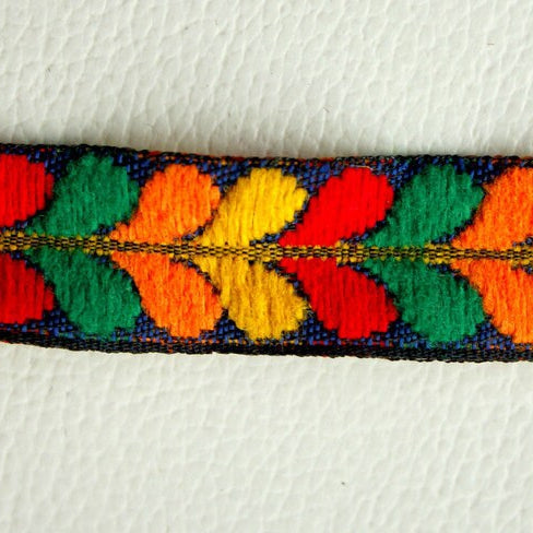 Blue Fabric Trim With Green, Yellow, Orange And Red Thread Embroidery
