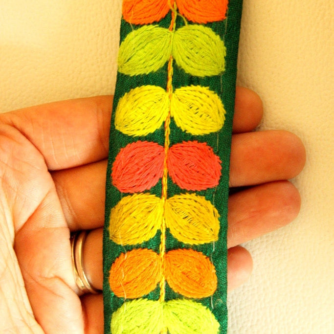 Green Fabric Trim With Pink, Yellow, Orange And Green Embroidery