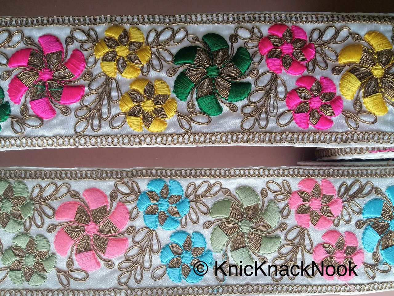 Off White Fabric Trim With Bronze, Green, Pink And Blue/Yellow Floral Embroidery
