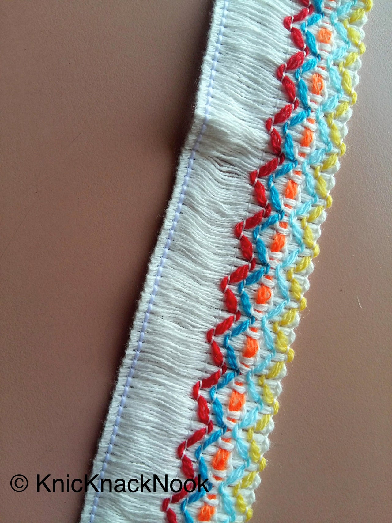 White / Black Threaded Trim With Red, Blue, Yellow And Orange Embroidery, Approx. 38mm Wide - 200317L100/01Trim