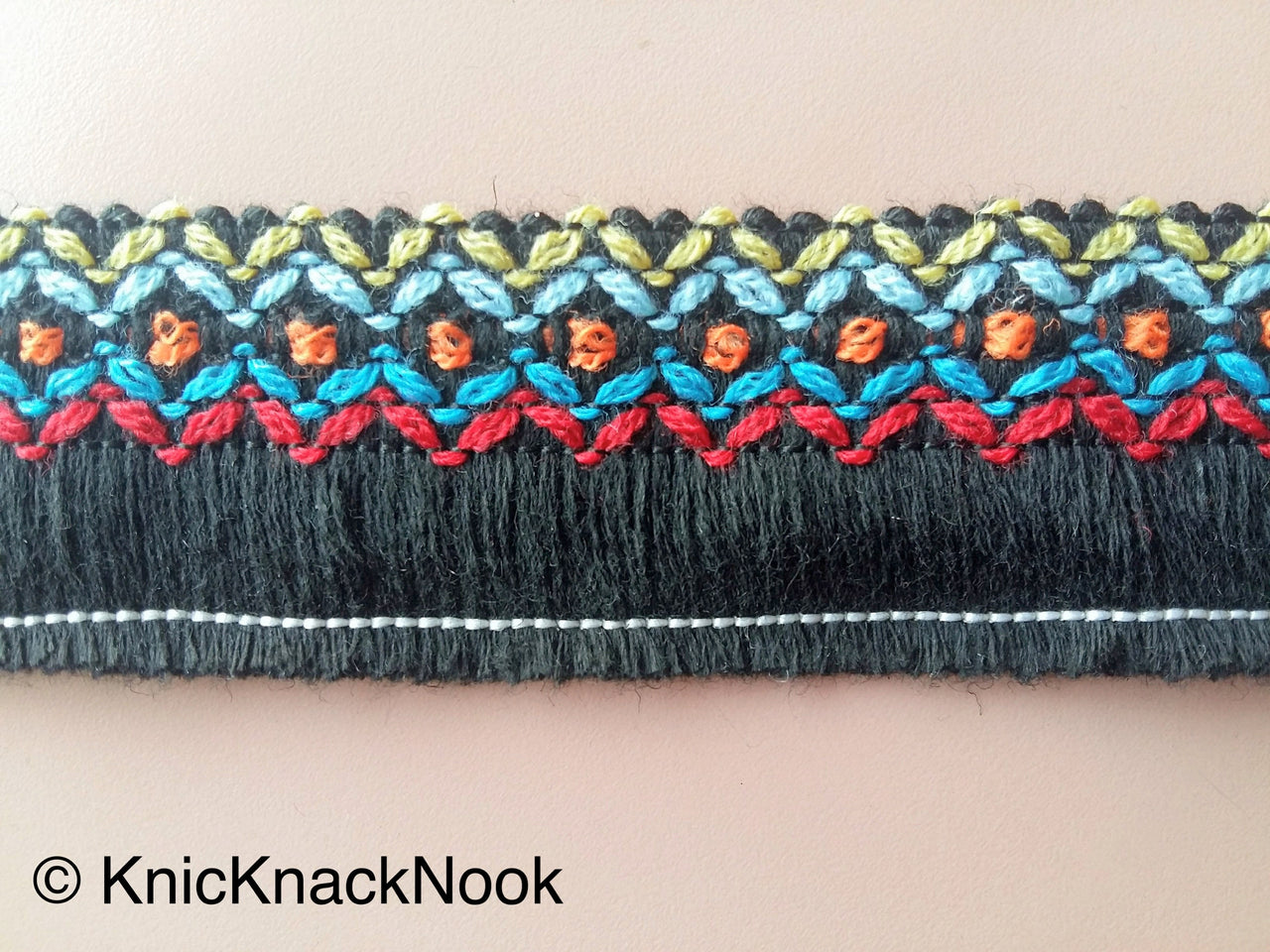 White / Black Threaded Trim With Red, Blue, Yellow And Orange Embroidery
