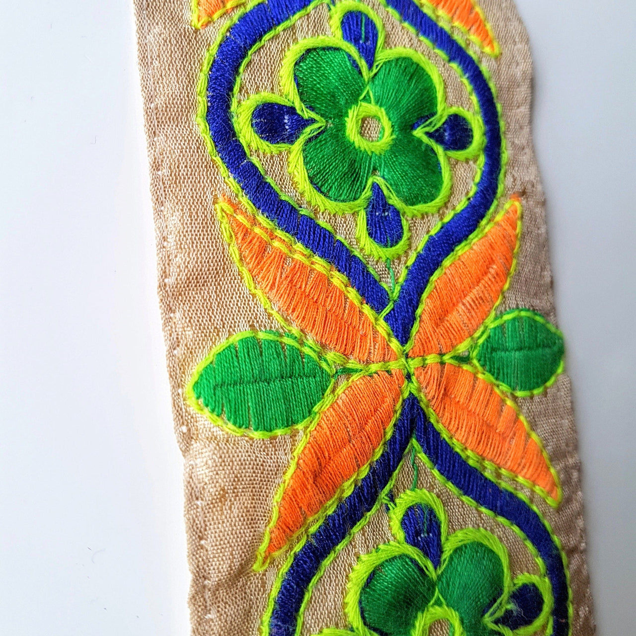 Beige Art Silk Fabric Trim With Orange, Green, Blue And Yellow Floral Embroidery