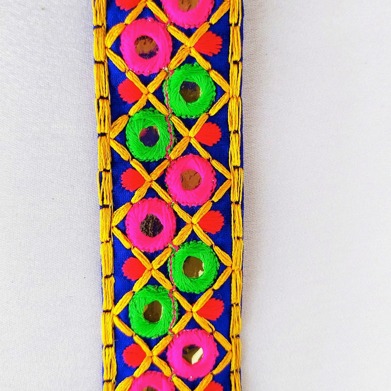 Blue Cotton Fabric Mirrored Trim With Embroidery In Fuchsia Pink, Green, Red & Yellow Threads