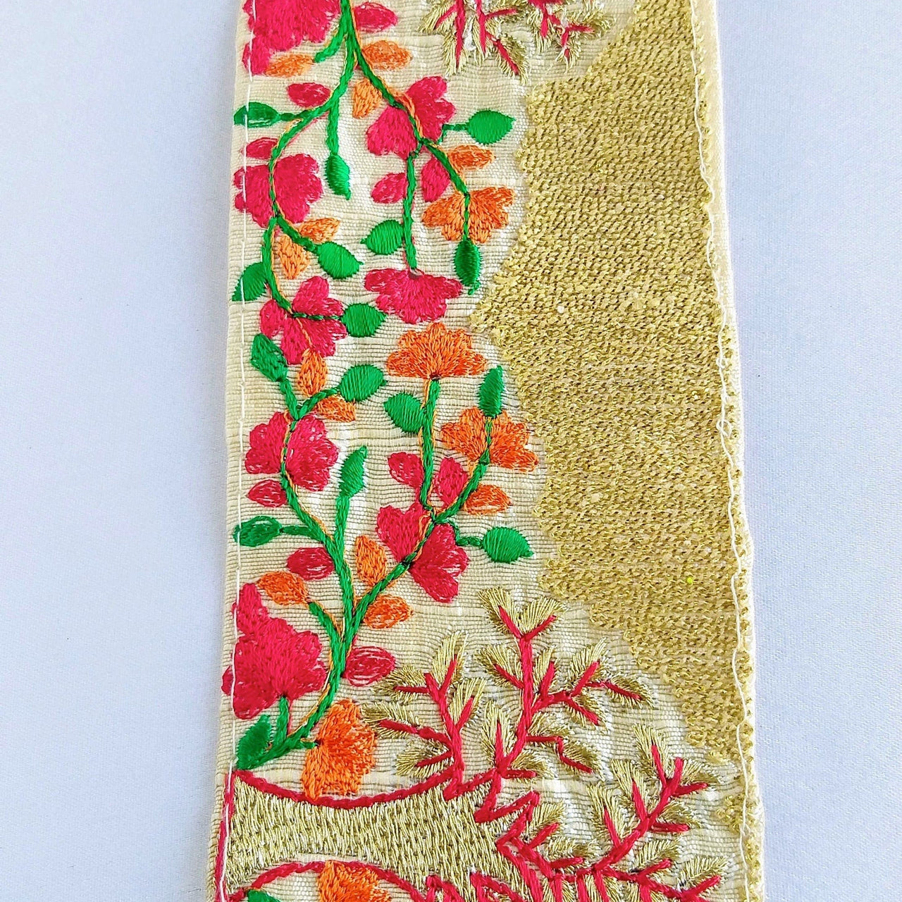 Beige Fabric Trim With Intricate Floral And Trees Embroidery In Gold, Red, Green And Orange Thread
