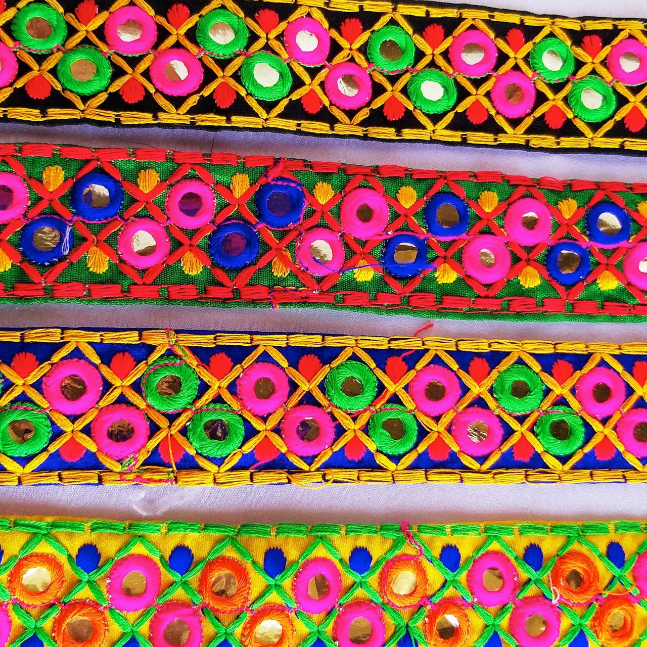 Blue Cotton Fabric Mirrored Trim With Embroidery In Fuchsia Pink, Green, Red & Yellow Threads
