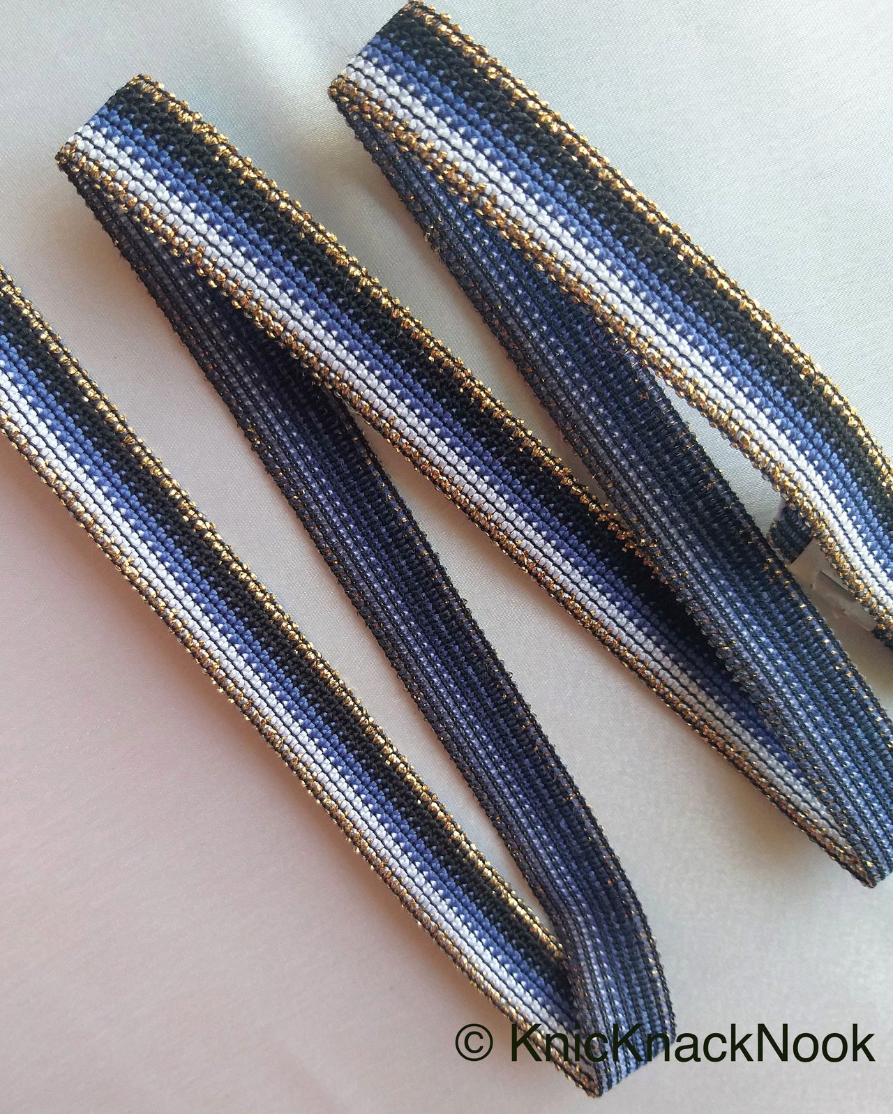 Black, Blue, White And Bronze Thread Lace Trim