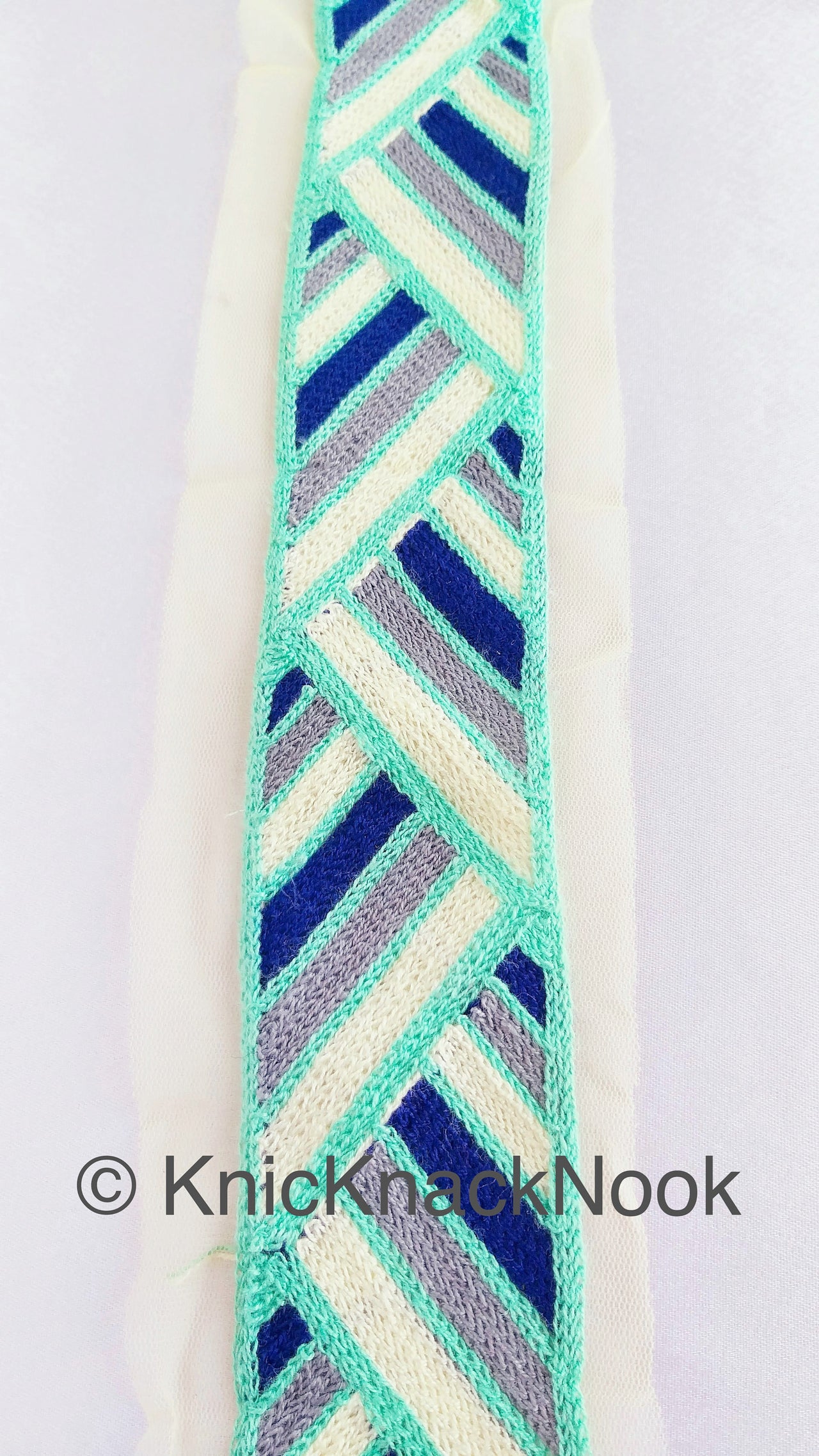 Beige Net With Blue, Off White, Cyan And Grey Embroidery, Geometric Pattern Trim