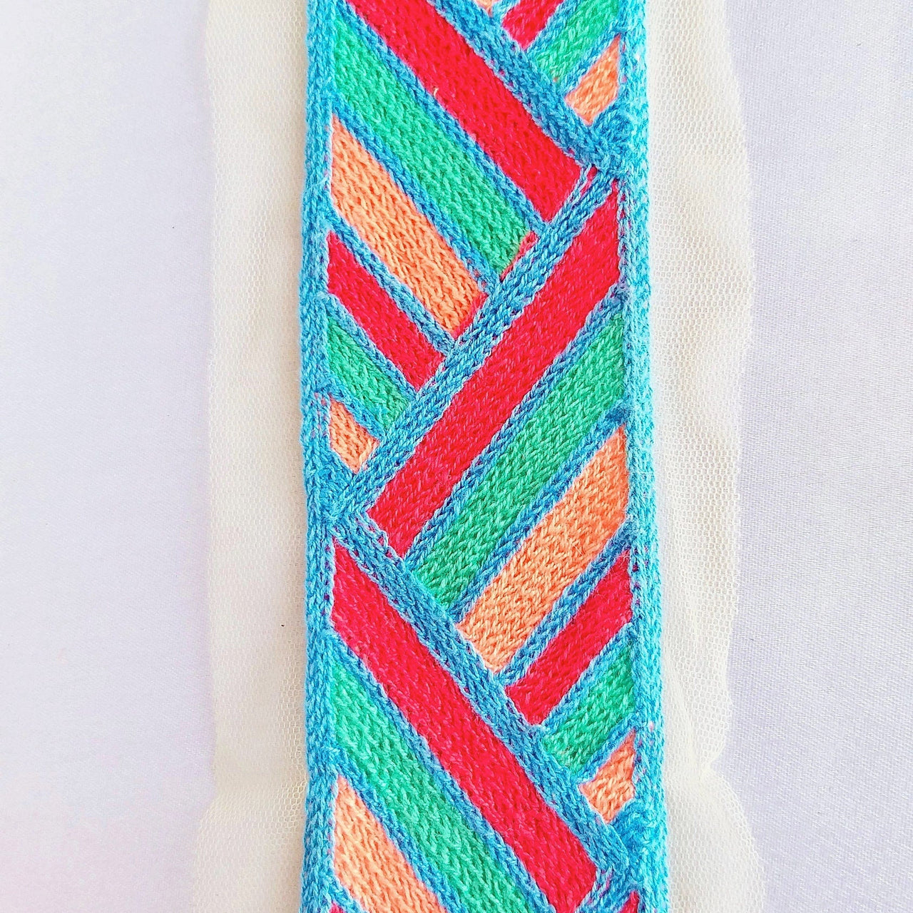 Beige Net With Blue, Red, Cyan And Coral Pink Embroidery