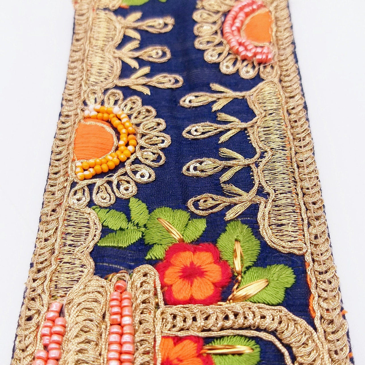 Navy Blue Art Silk Fabric Trim With Green, Orange, Red And Gold Floral Embroidery
