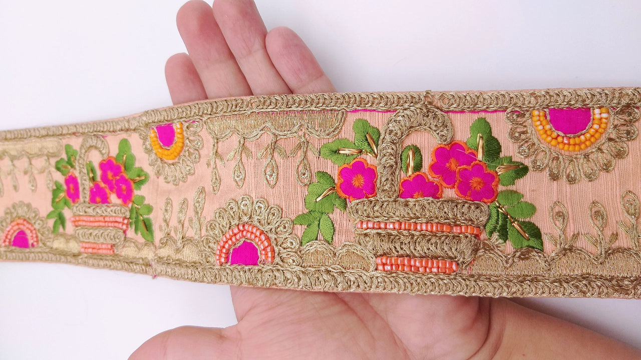 Peach Art Silk Fabric Trim With Green, Orange, Fuchsia Pink And Gold Floral Embroidery