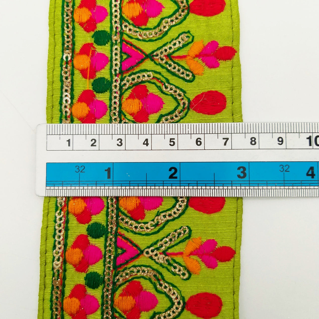 Green Fabric Trim With Green, Fuchsia Pink, Red And Yellow Embroidery and Gold Sequins