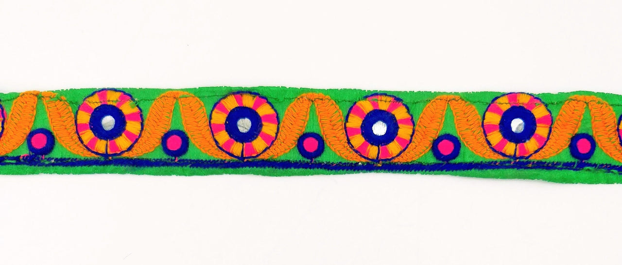 Green Mirrored Fabric Trim With Orange, Yellow, Blue And Pink Embroidery