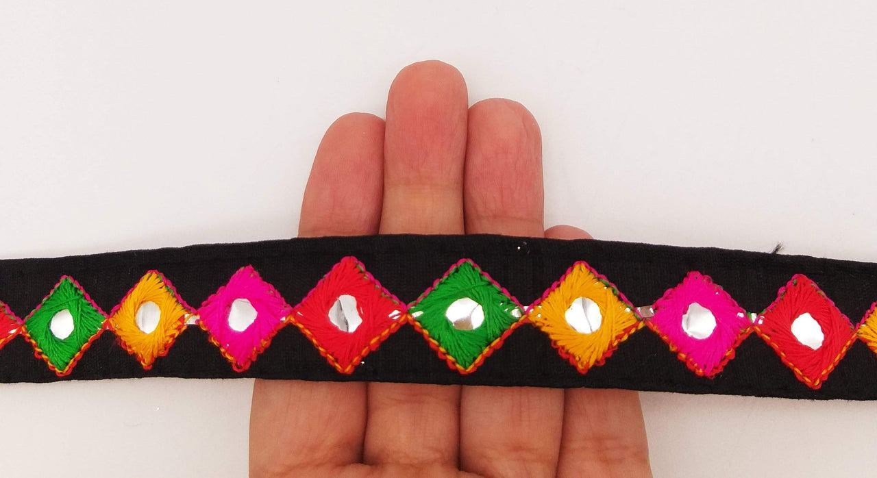 Wholesale Black Cotton Fabric Mirrored Trim With Embroidery In Yellow, Fuchsia Pink, Red & Green Threads