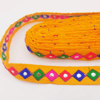 Thumbnail for Wholesale Yellow Cotton Fabric Mirrored Trim With Embroidery In Fuchsia Pink, Blue, Red & Green Threads