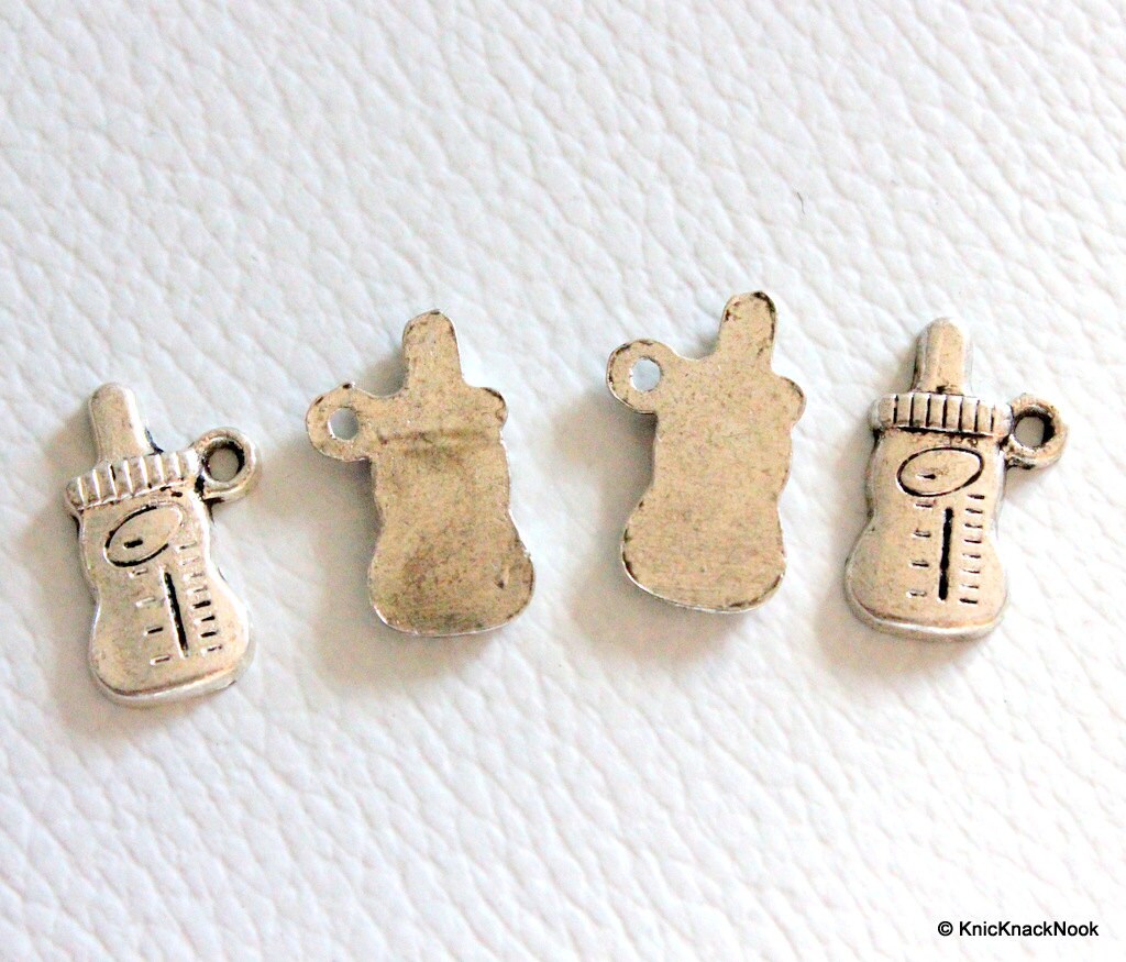 Silver baby bottle charms x 4