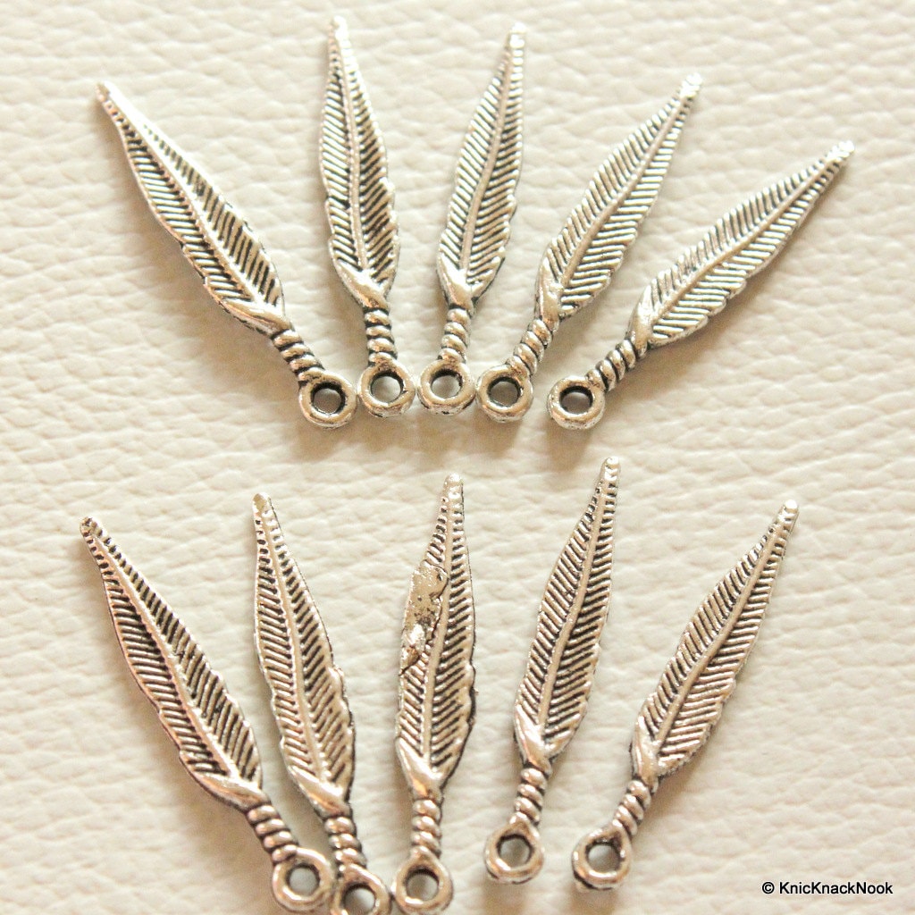 Feather Silver Tone Charms x 11