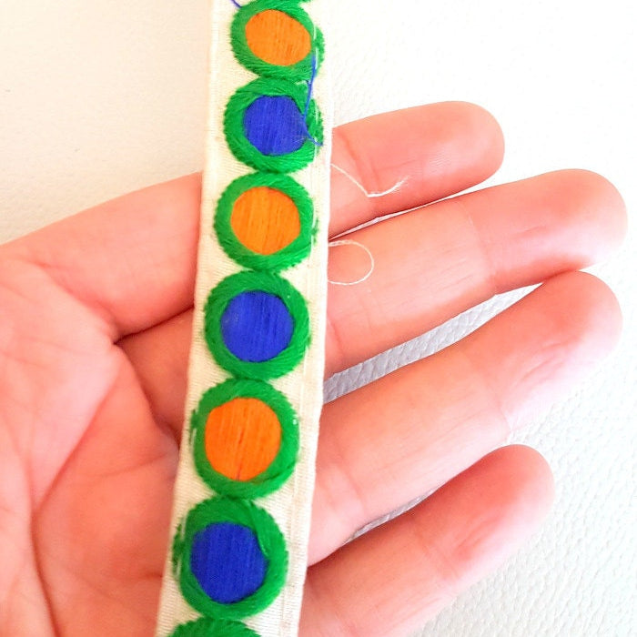 Off White Fabric Trim With Orange, Blue And Green Embroidery, Approx. 20mm Wide