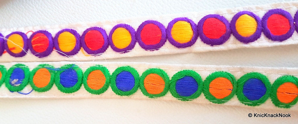 Off White Fabric Trim With Orange, Blue And Green Embroidery, Approx. 20mm Wide